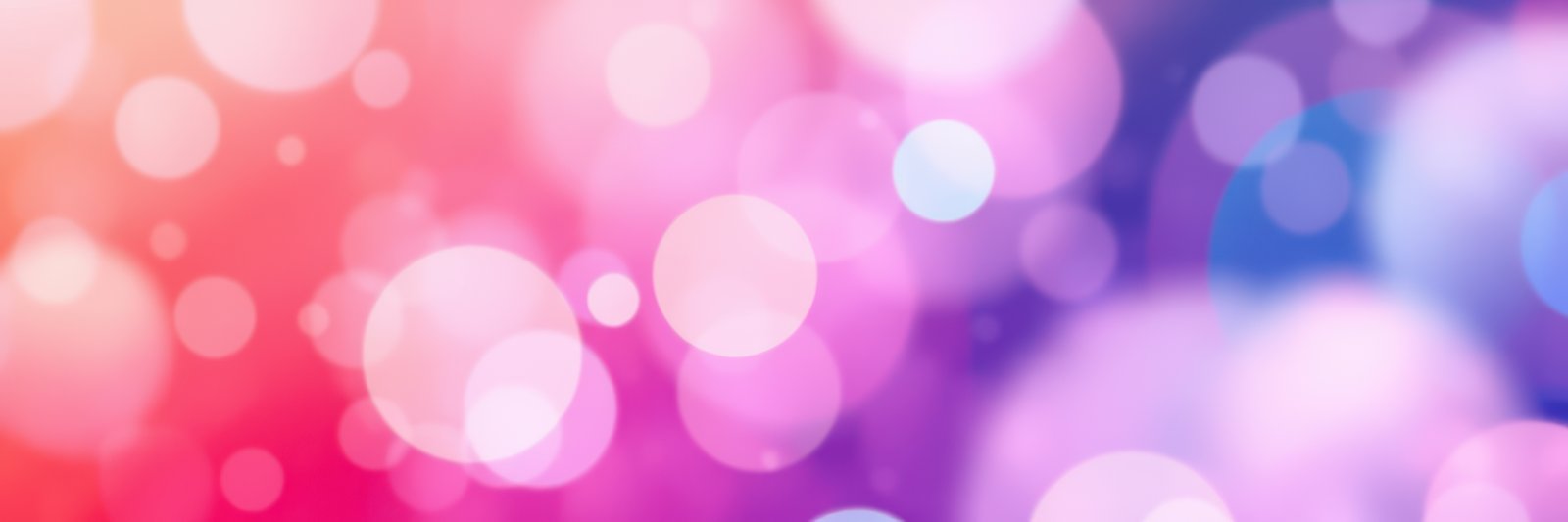Colorful bokeh background with vibrant circles creating a dreamy atmosphere at twilight